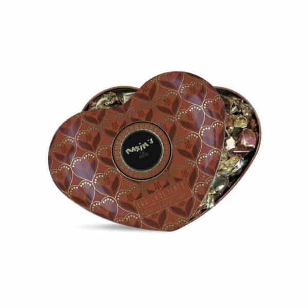 LARGE RED TIN HEART BOX WITH ASSORTED DARK MLIK CHOLATES NOUGAT. MAXIM S DE PARIS