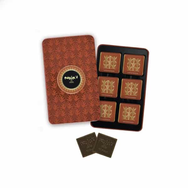 METAL BOX WITH 12 MILK CHOCOLATE SQUARES - MAXIM DE PARIS - LA MAISON - GOURMET CHOCOLATE