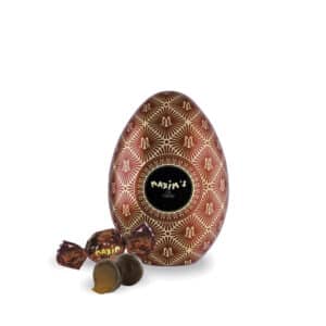 MAX 3339 - RED EGG TIN - CHOCOLATE BALLS WITH SOFT SALTED FLOWER CARAMEL - maxims de paris, la maison du vin