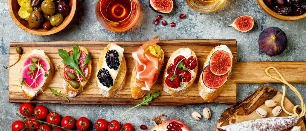 Food and wine pairing guide with dishes and wine glasses