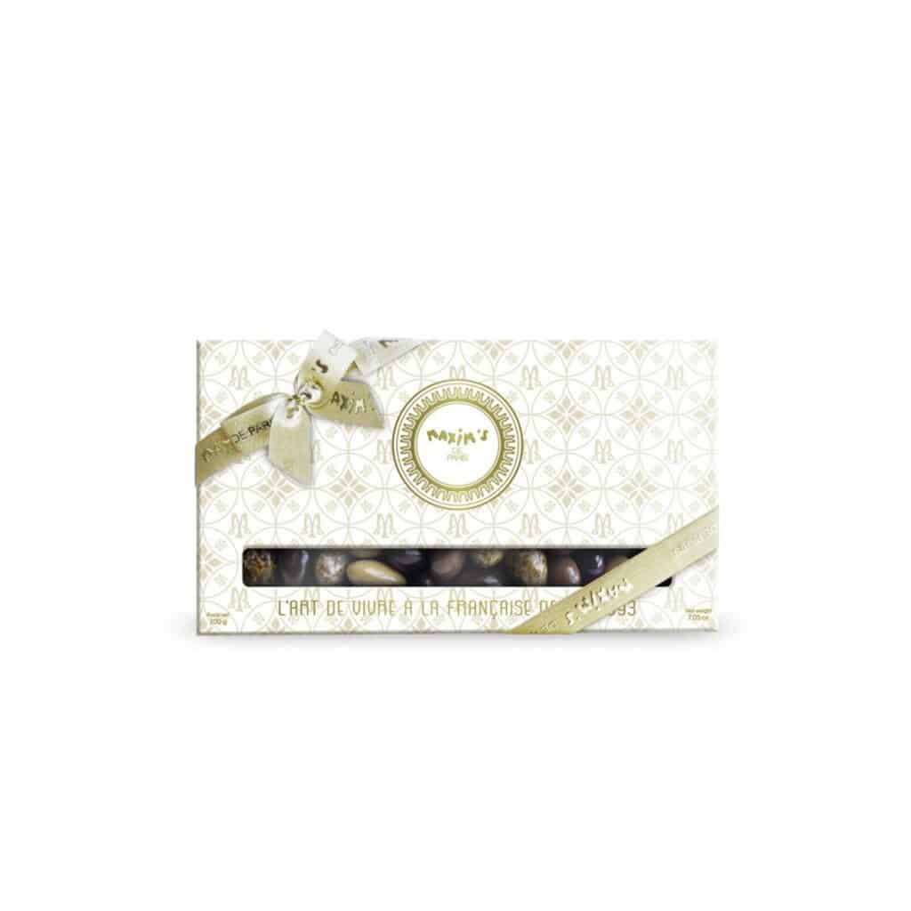 “Maxim’s white and gold luxury gift box with four compartments of assorted chocolate-coated almonds”