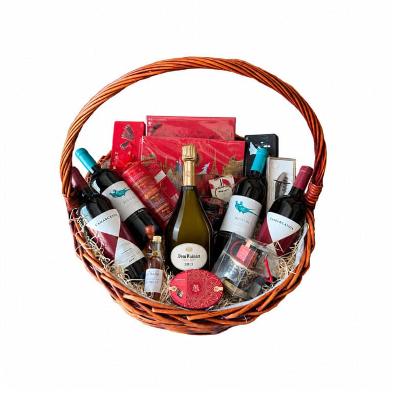 Gift basket with Dom Ruinart 2013, two GAJA Rossj-Bass bottles, two Ca’Marcanda bottles and Maxim’s chocolates