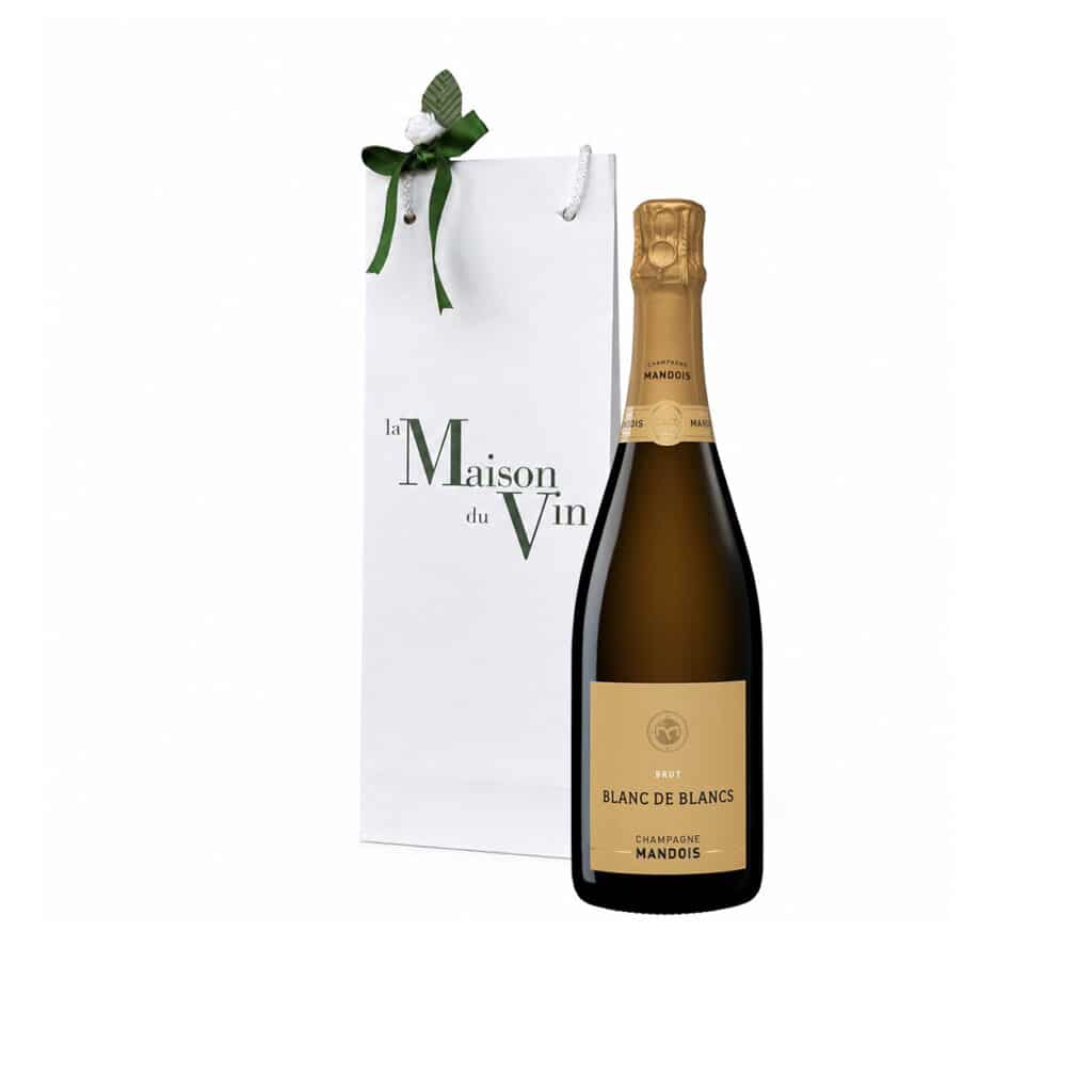 White luxury gift bag with one bottle of Mandois Blanc de Blancs Champagne