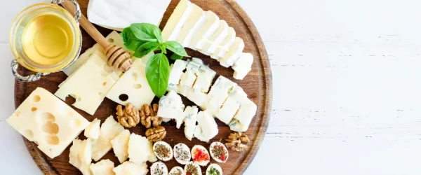 Cheese platter with red and white wine pairing suggestions